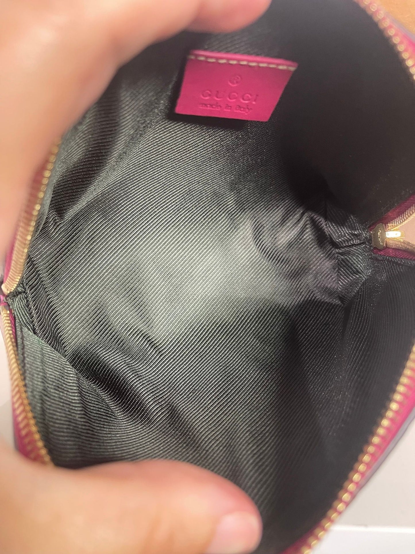 121. Gucci Fuscia Cosmetic Bag