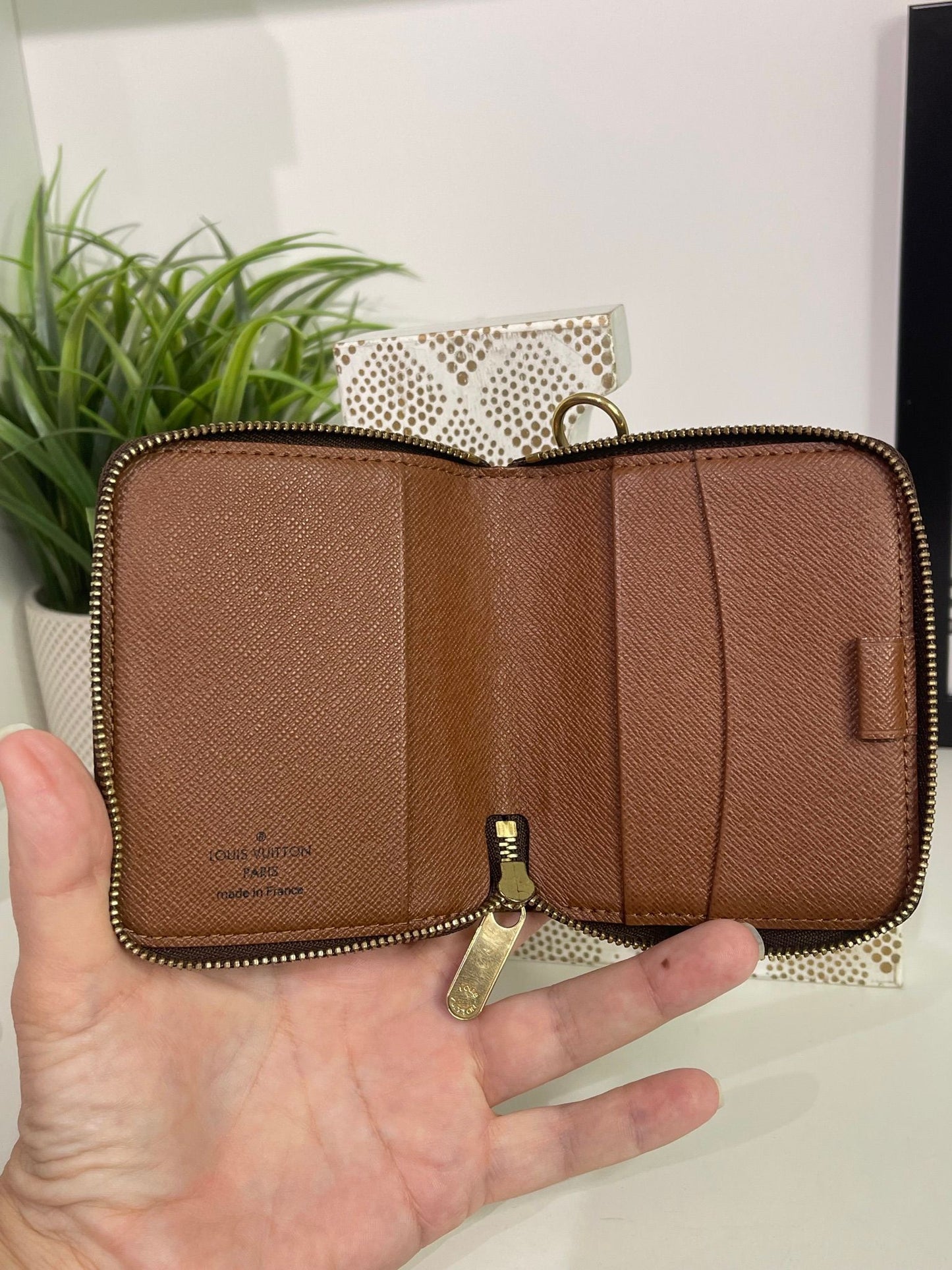 12. Louis Vuitton Monogram Zippy Card Holder