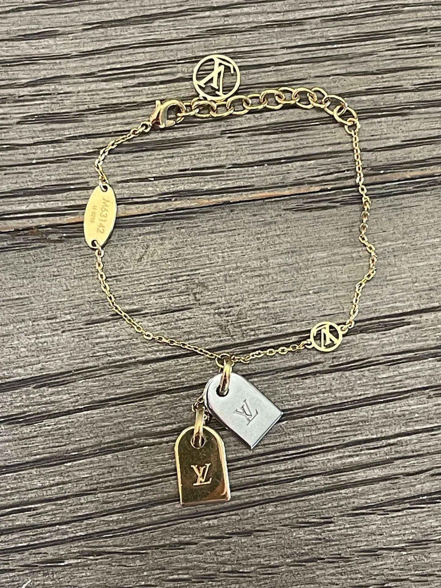 52. Louis Vuitton Nanogram Two Tone Bracelet