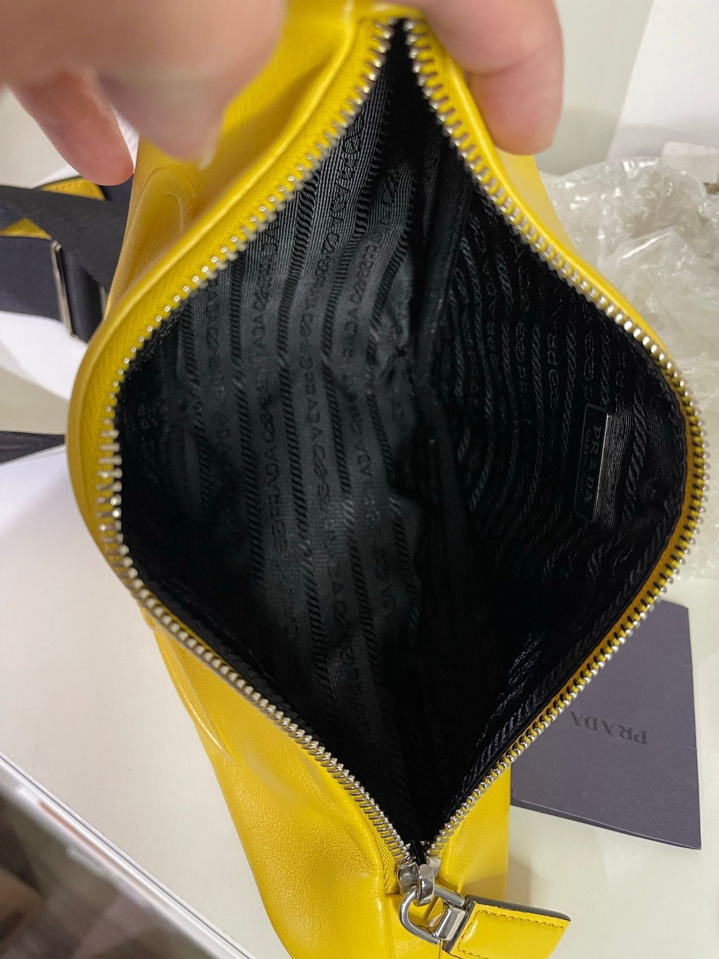 28. Prada Yellow Logo Triangle Crossbody