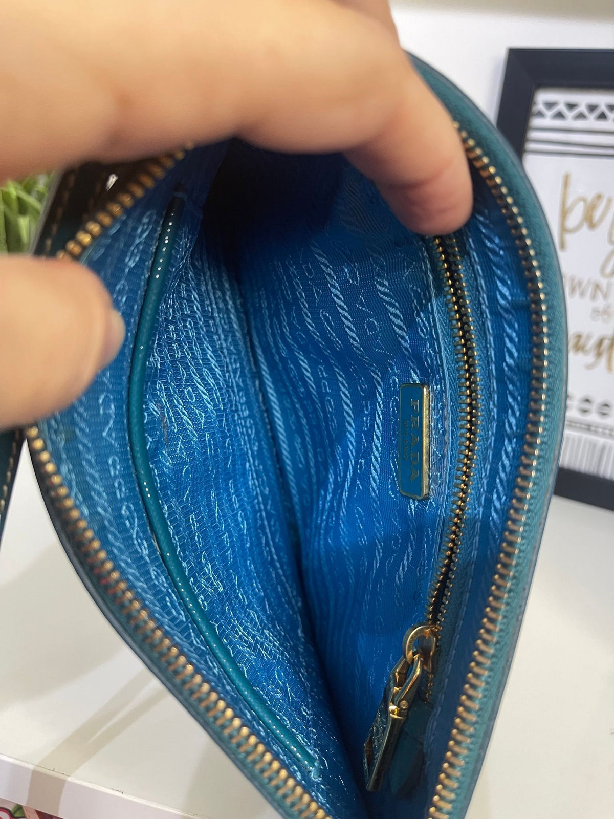 49. Prada Teal Pouchette Crossbody