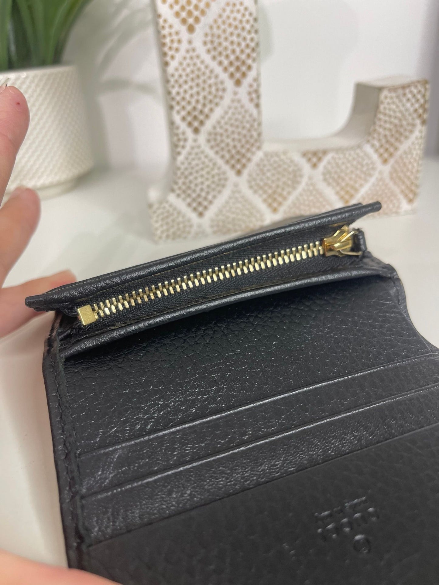 76. Gucci Supreme Compact Wallet Black Leather Trim