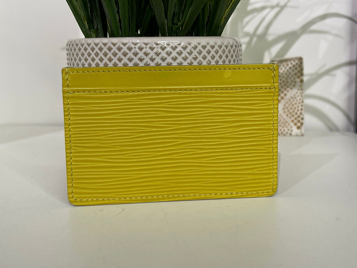 60. Louis Vuitton Yellow Epi Card Holder