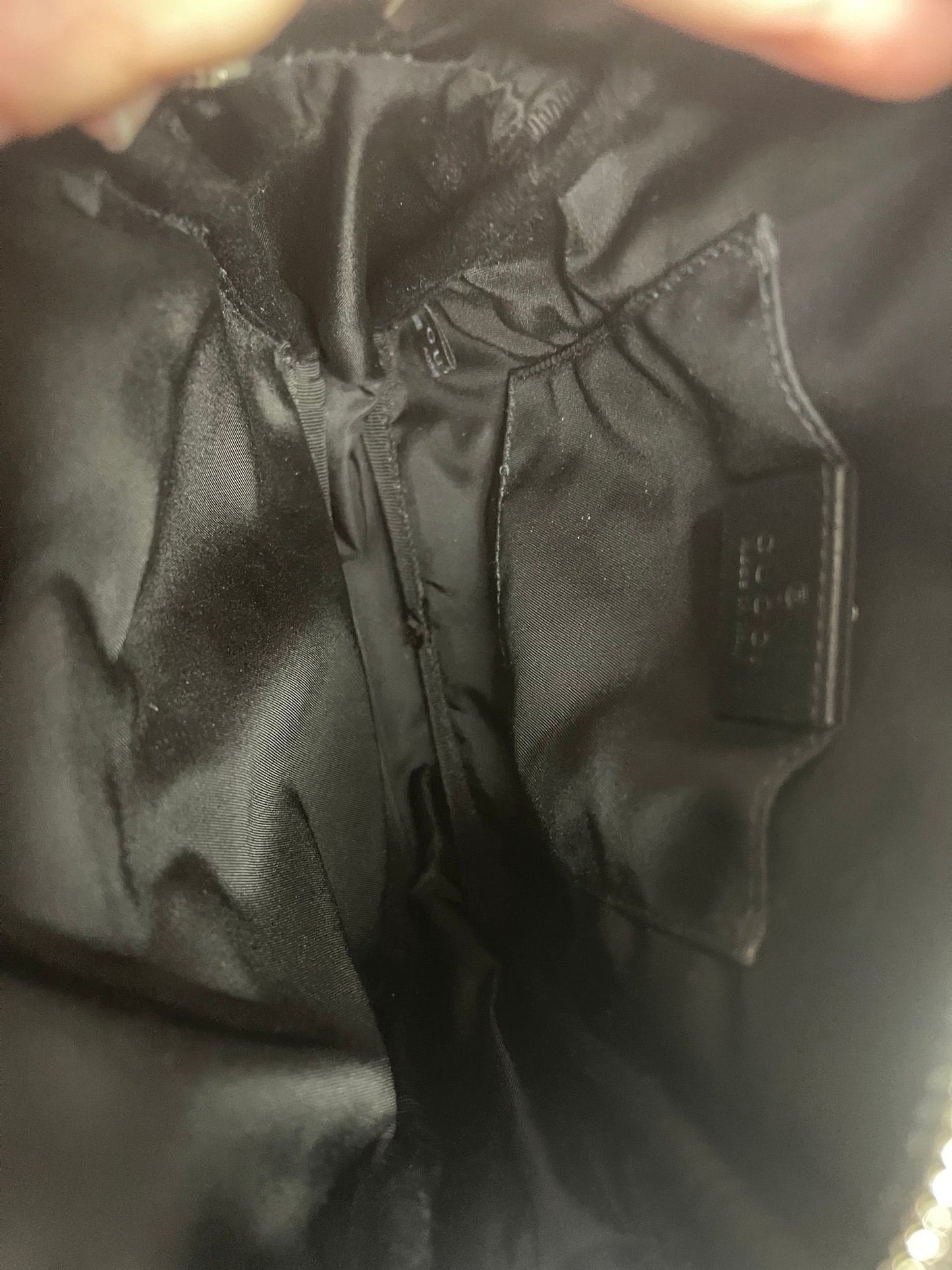 65. Gucci Nylon Off The Grid Crossbody