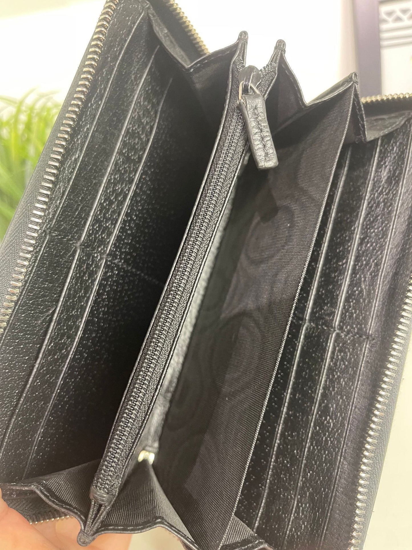 86. Gucci Psychedelic Zippy Wallet