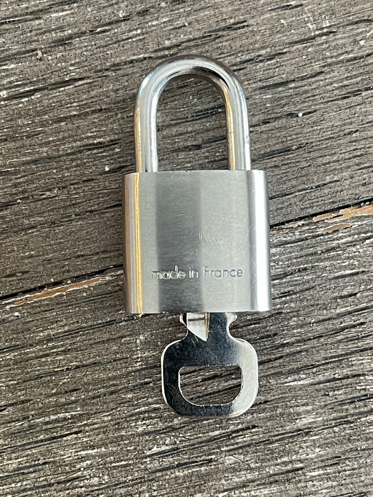 147. Louis Vuitton Silver Lock & Key #322
