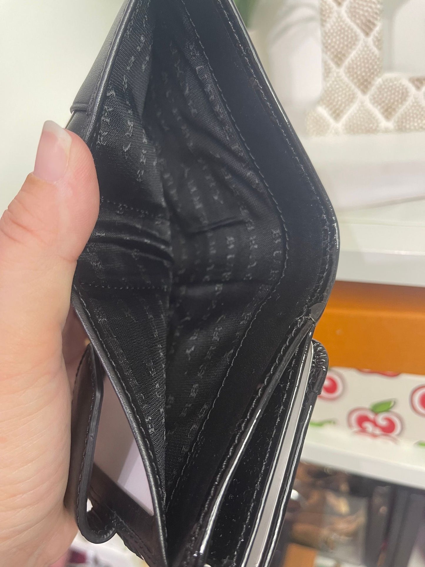 67. Burberry Compact Wallet