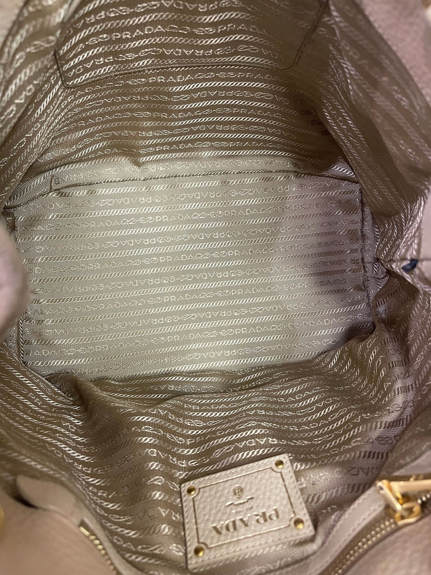 44. Prada Beige Hobo Bag