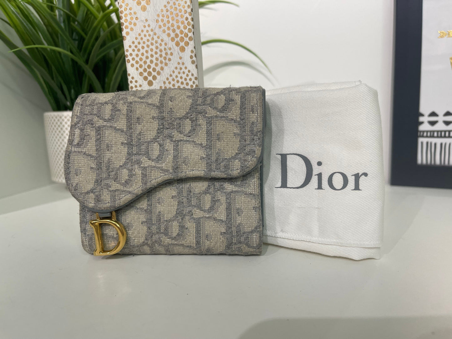 80. Christian Dior Oblique Saddle Lotus Trifold Wallet