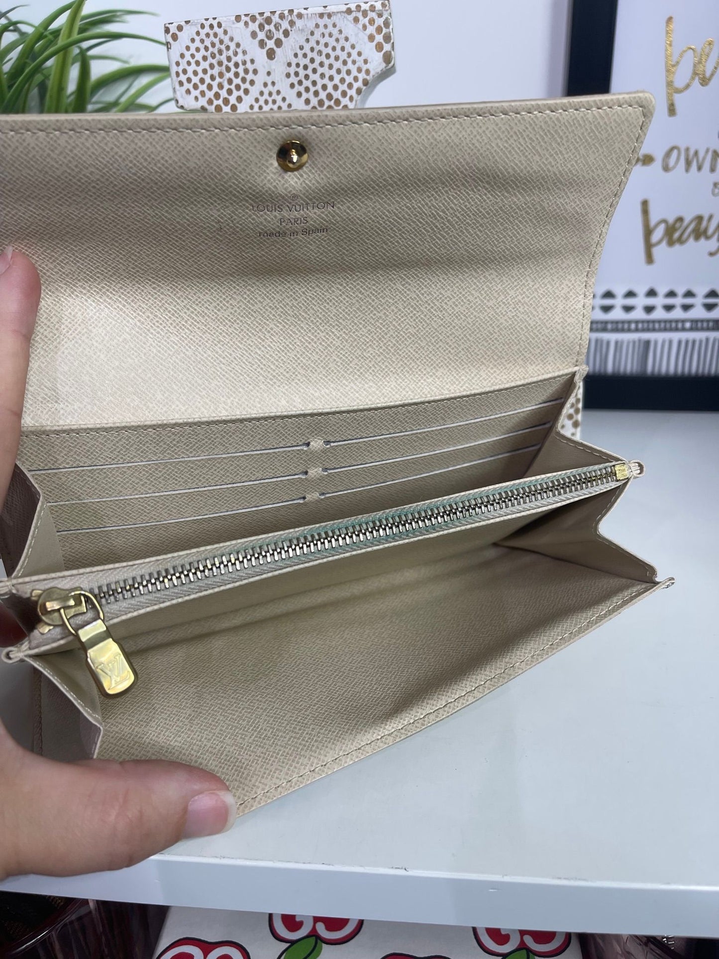 32. Louis Vuitton Damier Azur Sarah Wallet