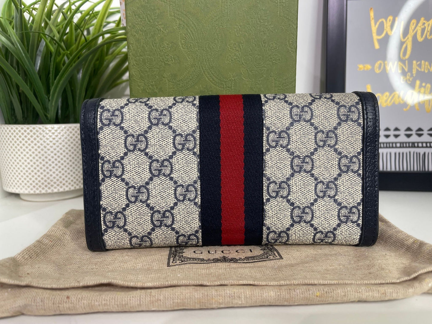 117. Gucci Supreme Navy Long Wallet