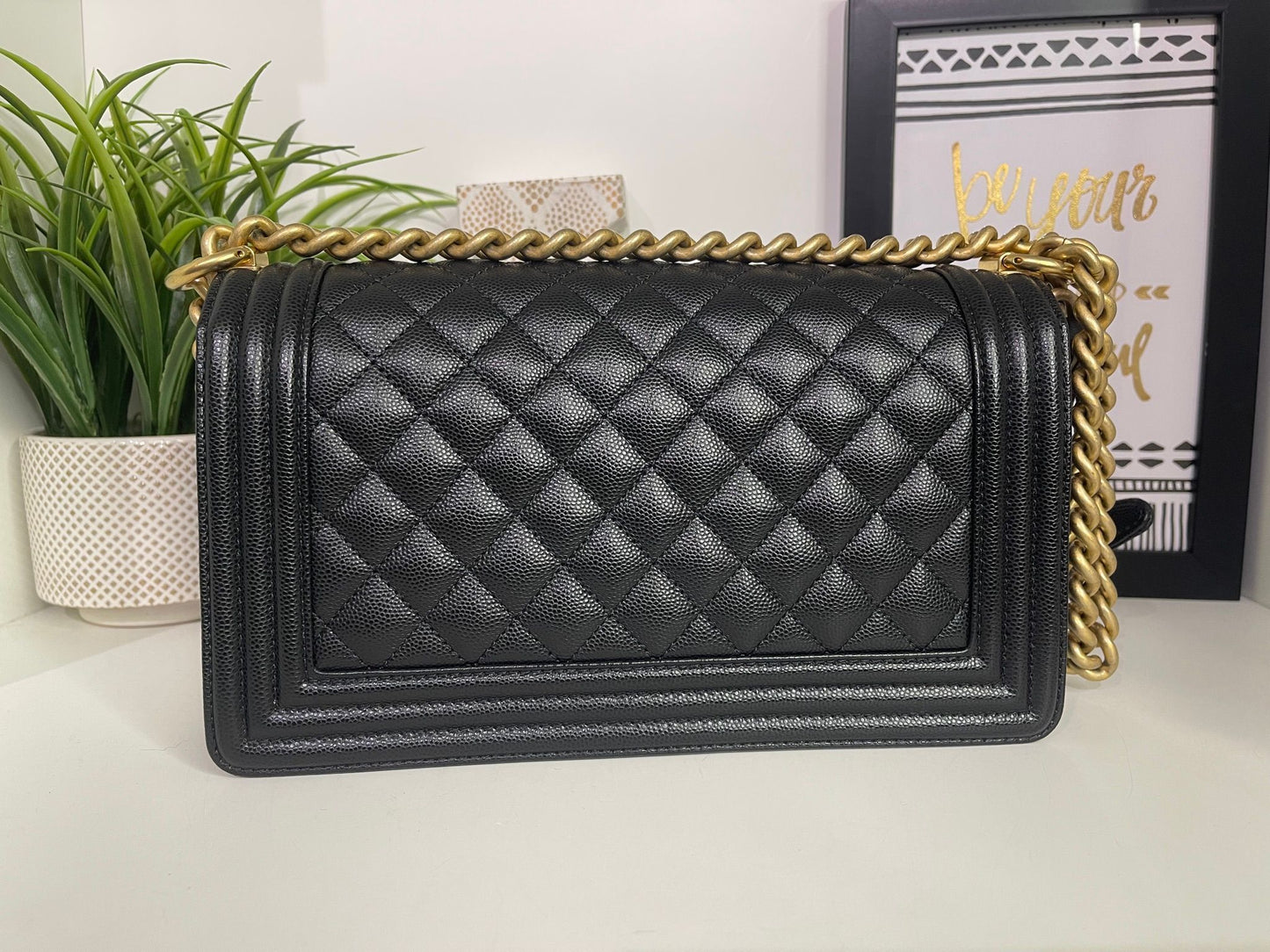 5. Chanel Black Medium Boy Caviar Full Inclusion