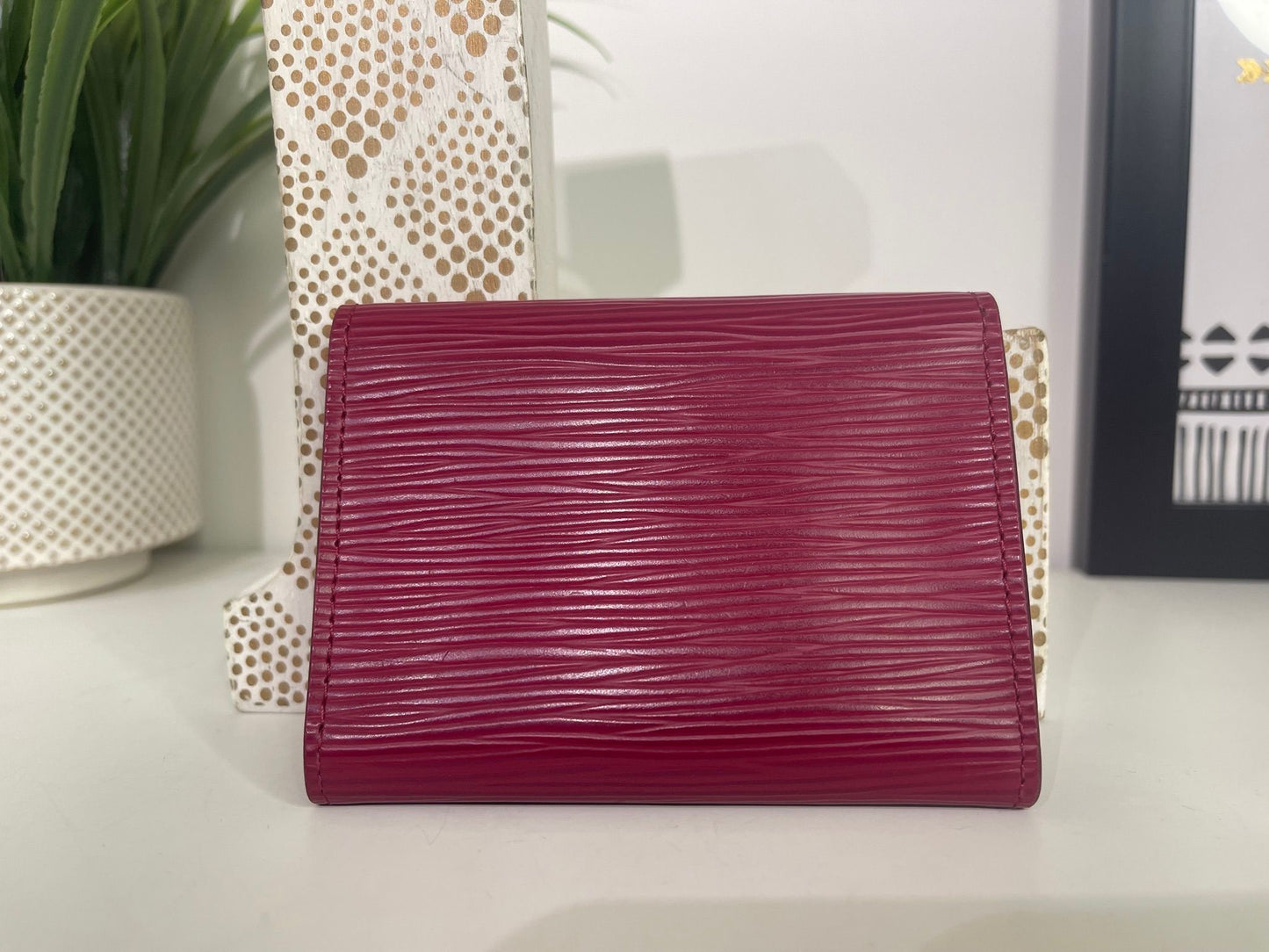 62. Louis Vuitton Fuscia Epi Card Holder
