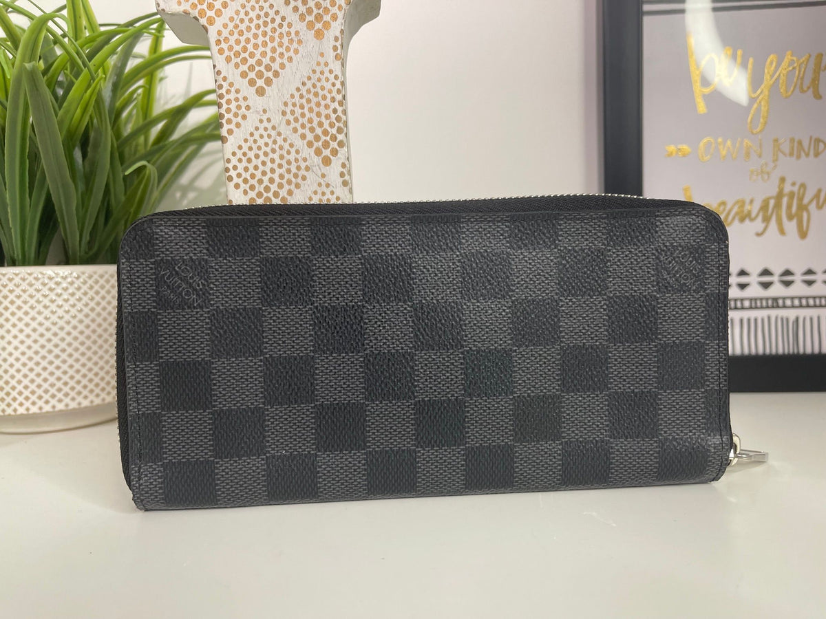 50. Louis Vuitton Damier Graphite Zippy Wallet