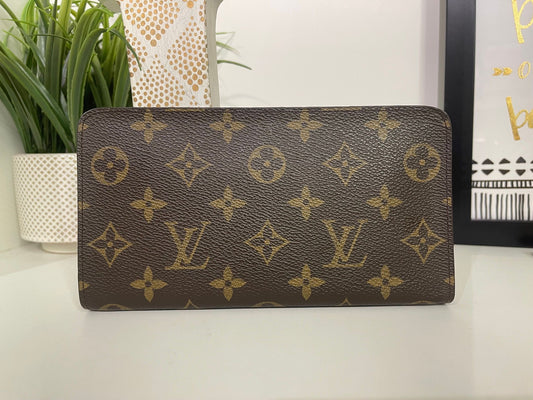 120. Louis Vuitton Monogram Porte Monnaie Zip Wallet