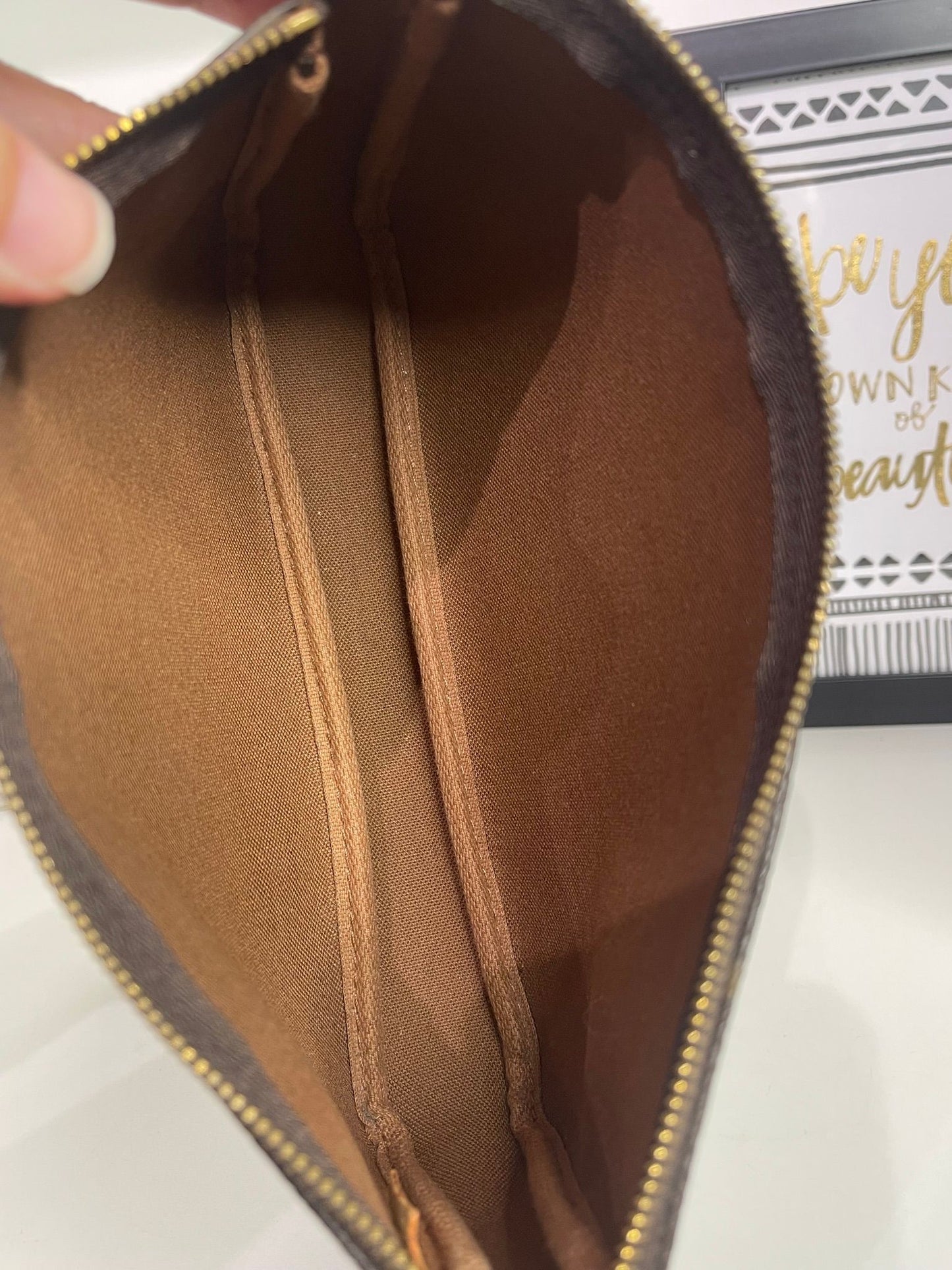 70. Louis Vuitton Monogram Pouchette