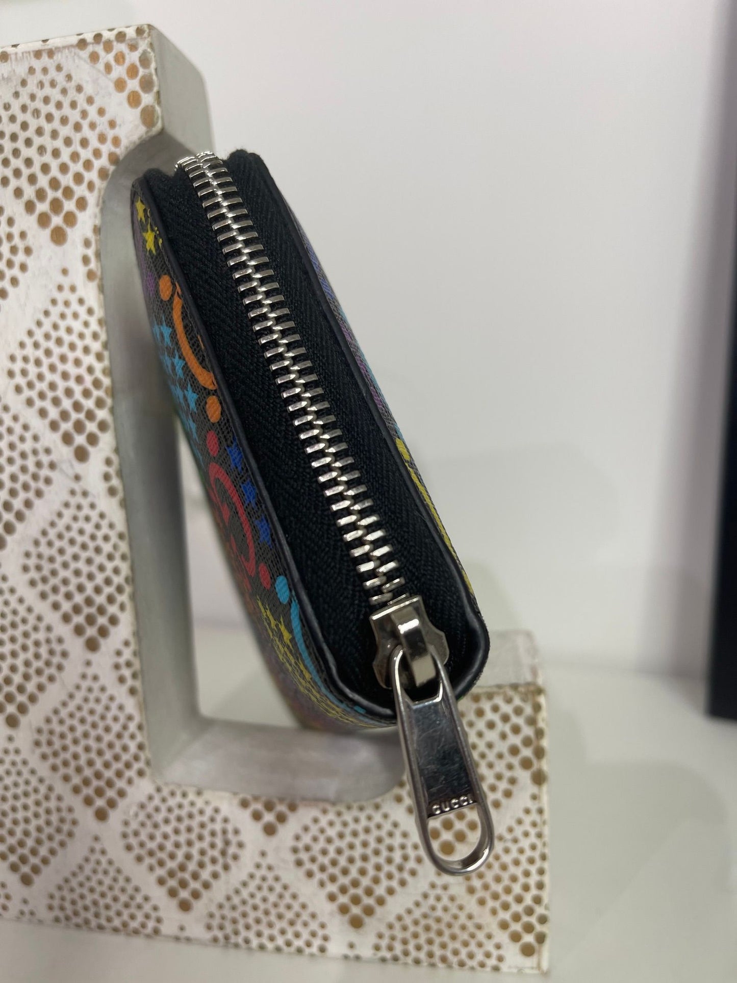86. Gucci Psychedelic Zippy Wallet