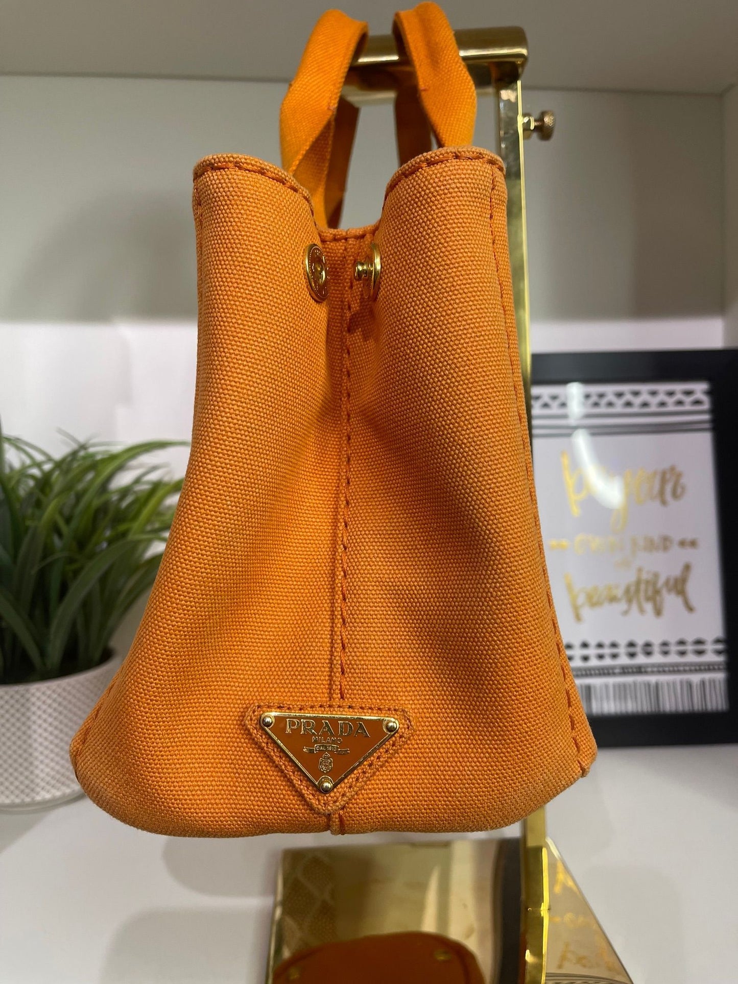 100. Prada Small Orange Canapa