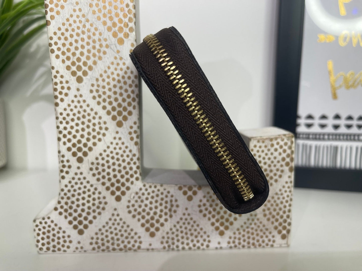 16. Louis Vuitton Damier Ebene Zippy Card Holder