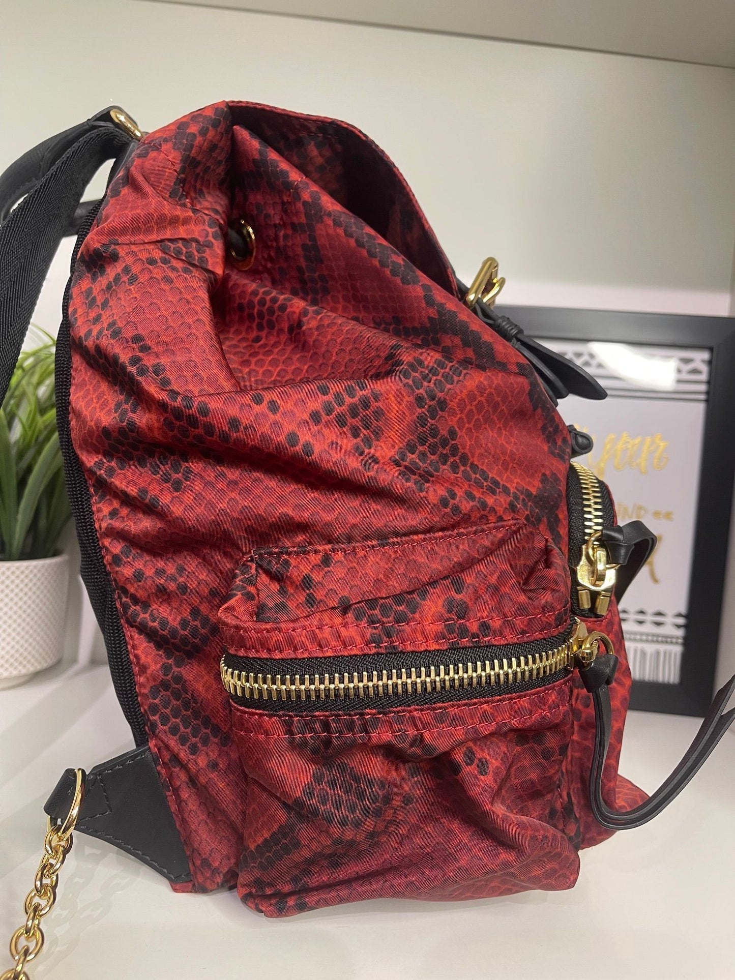11. Burberry Nylon Red/Black Snake Print Backpack