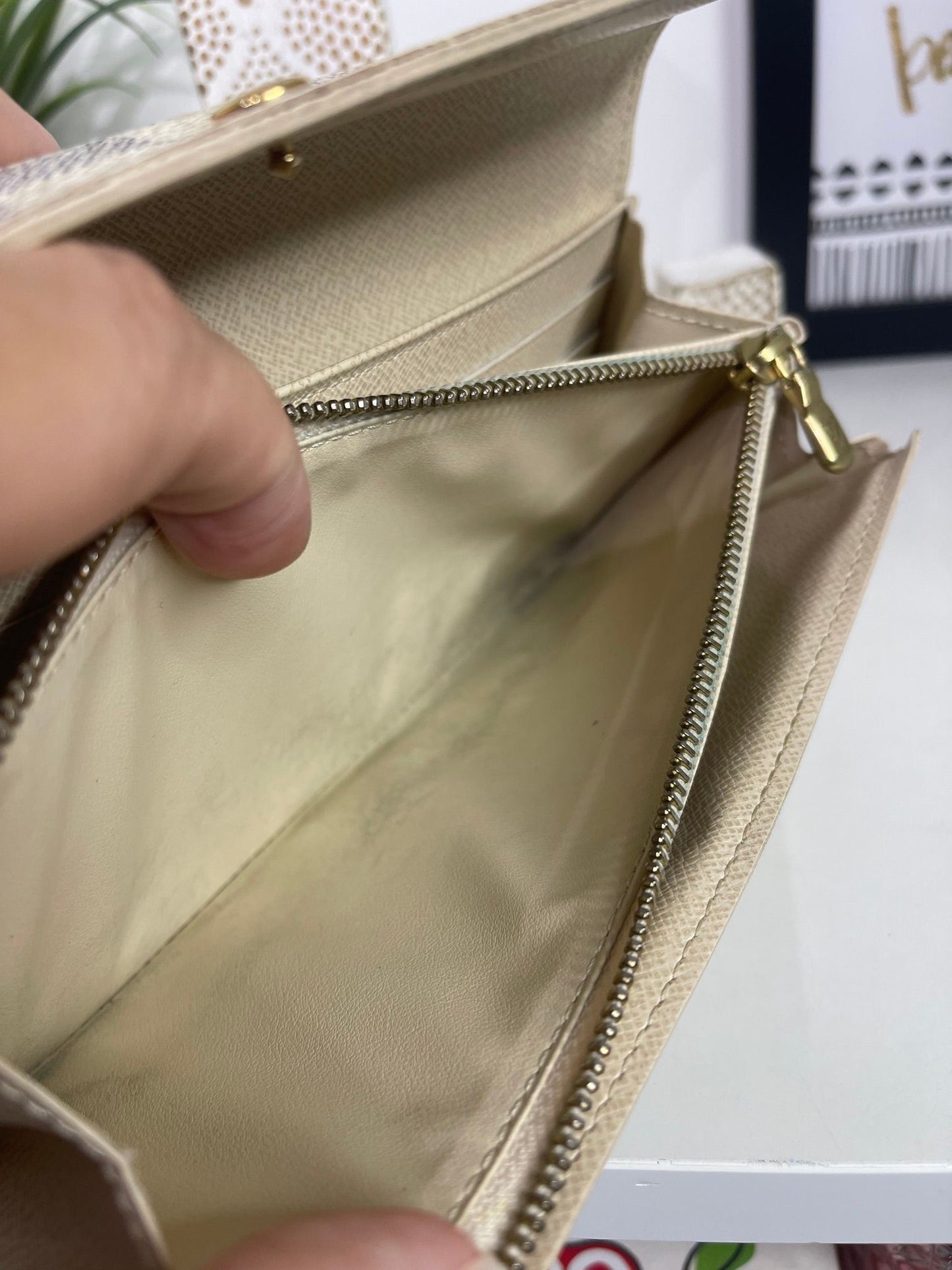 32. Louis Vuitton Damier Azur Sarah Wallet