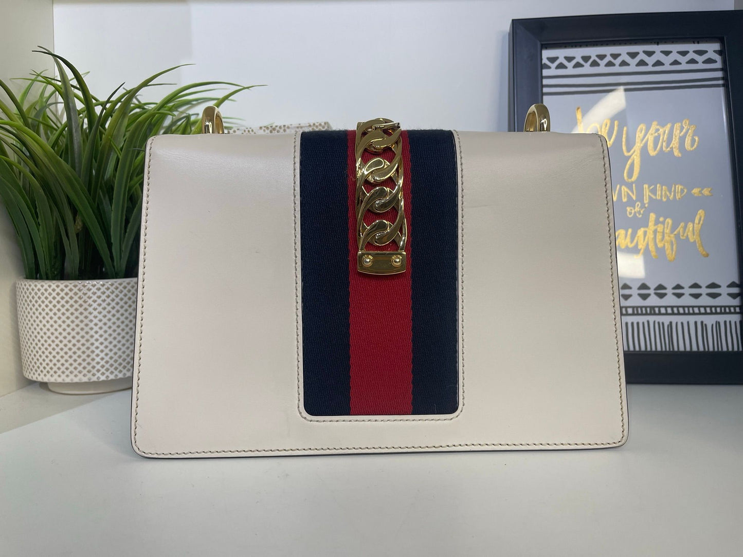 6. Gucci Ivory Sylvie 2 Way Large