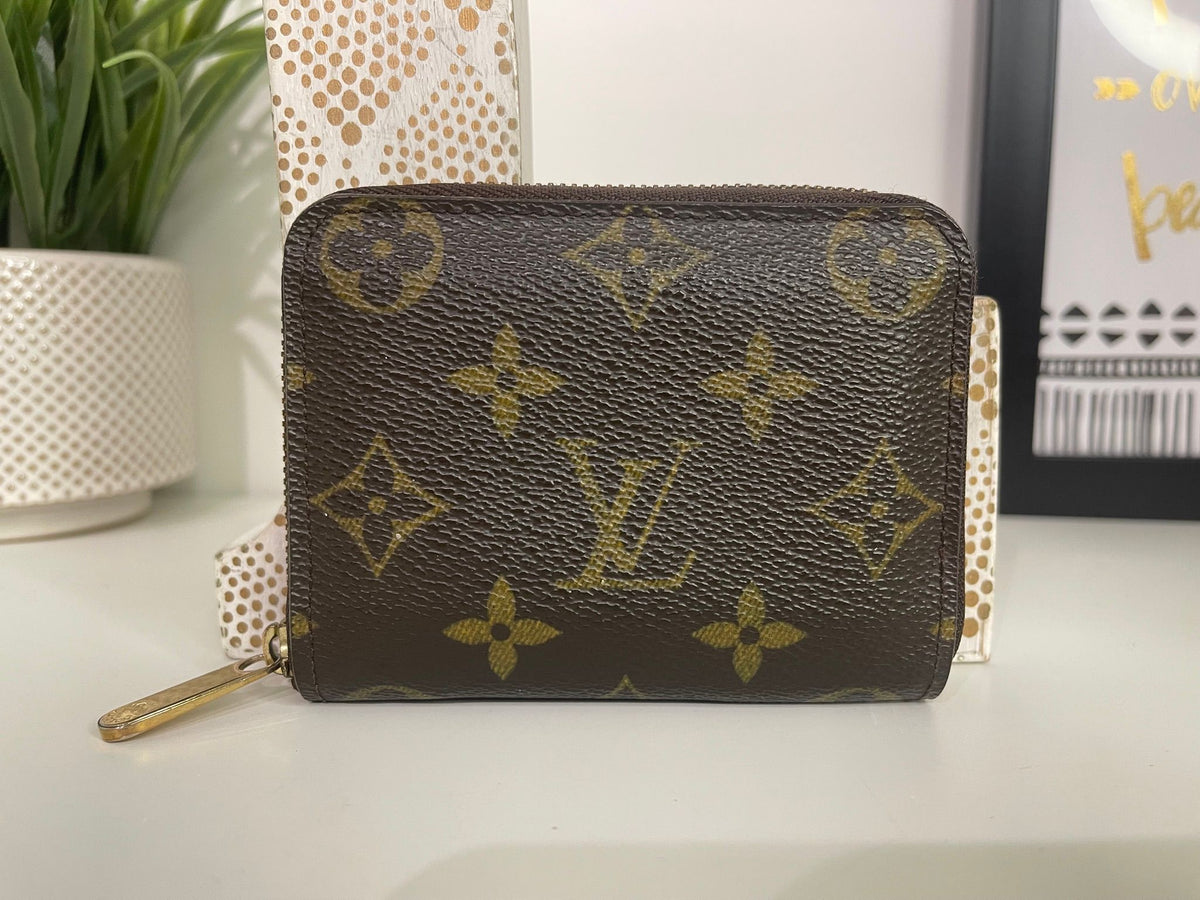 49. Louis Vuitton Monogram Zippy Card Holder