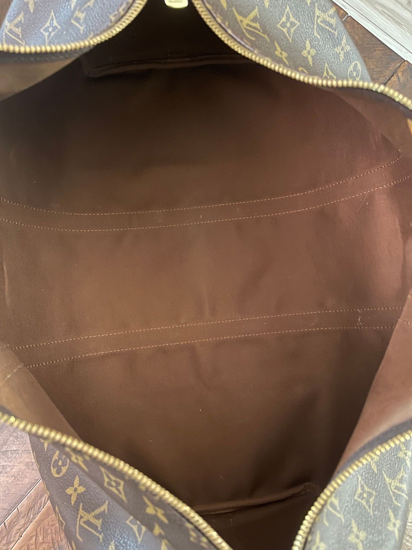 38. Louis Vuitton KeepAll 50 Bandolier (NO STRAP)