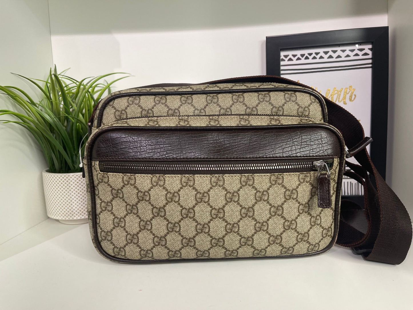 49. Gucci Supreme Crossbody Camera Bag