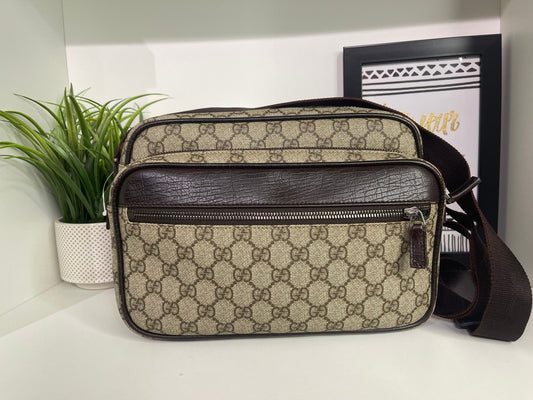 49. Gucci Supreme Crossbody Camera Bag