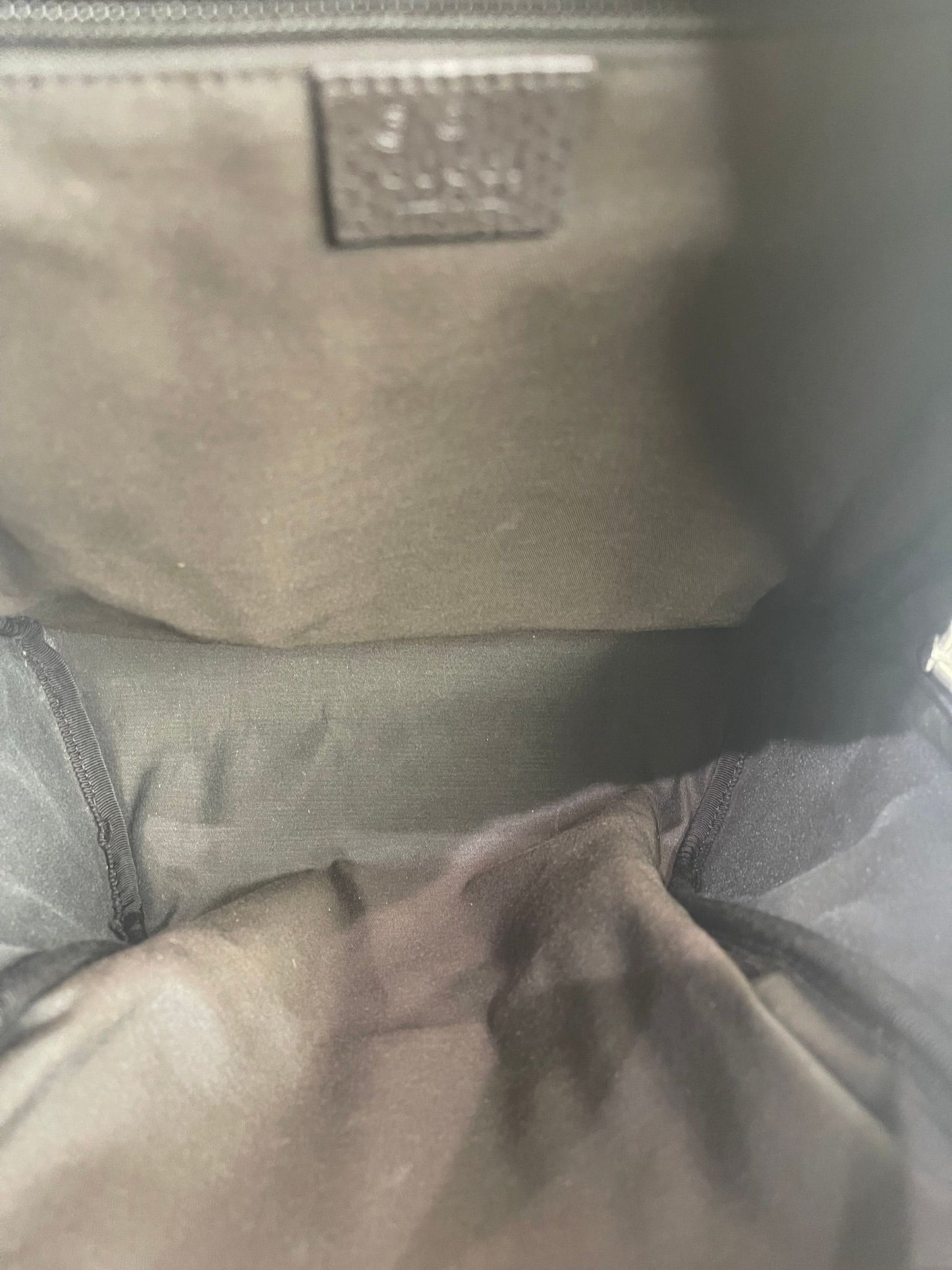 103. Gucci Canvas Backpack