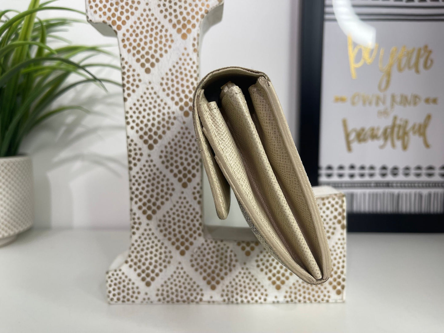 32. Louis Vuitton Damier Azur Sarah Wallet