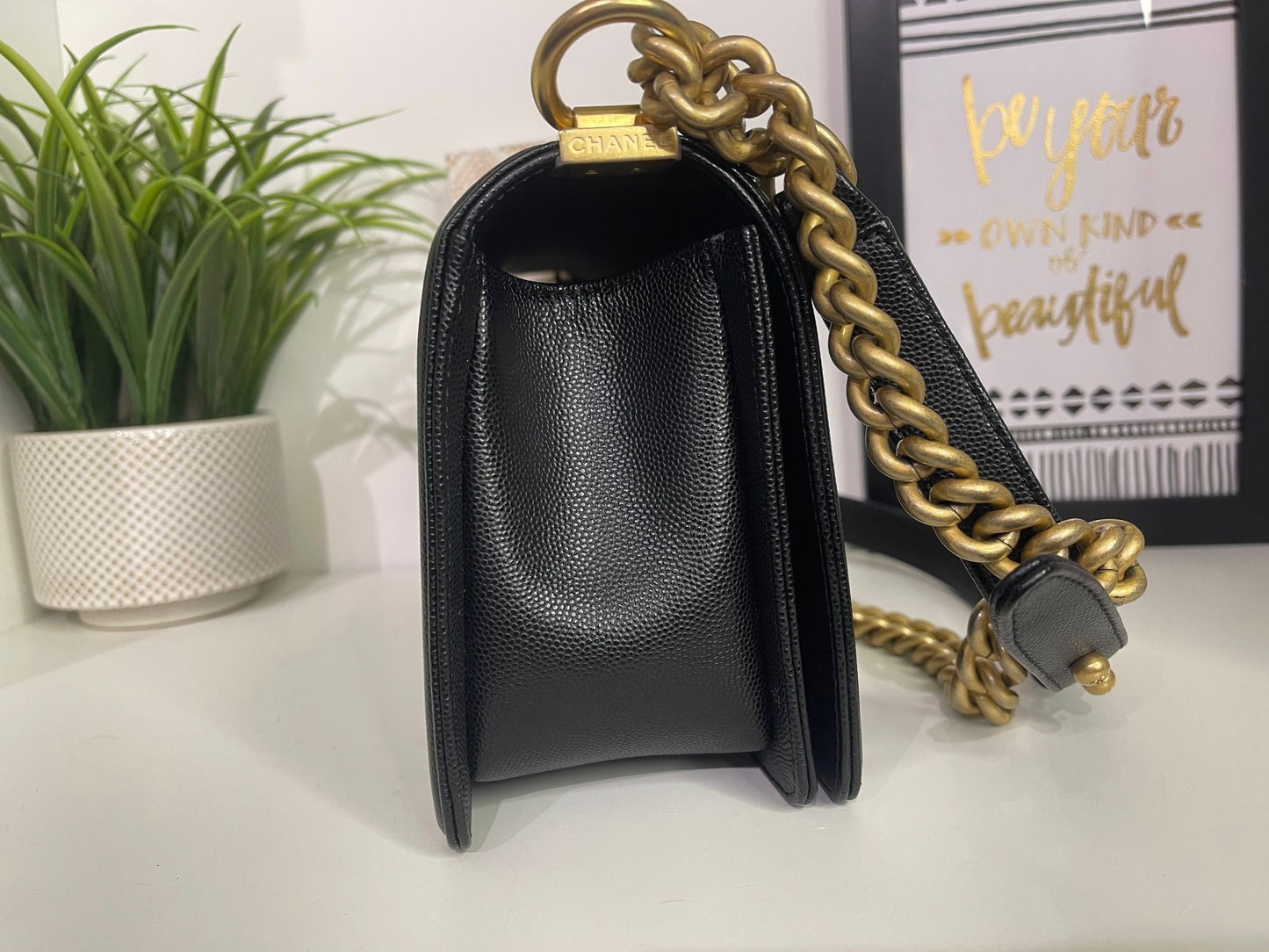 5. Chanel Black Medium Boy Caviar Full Inclusion