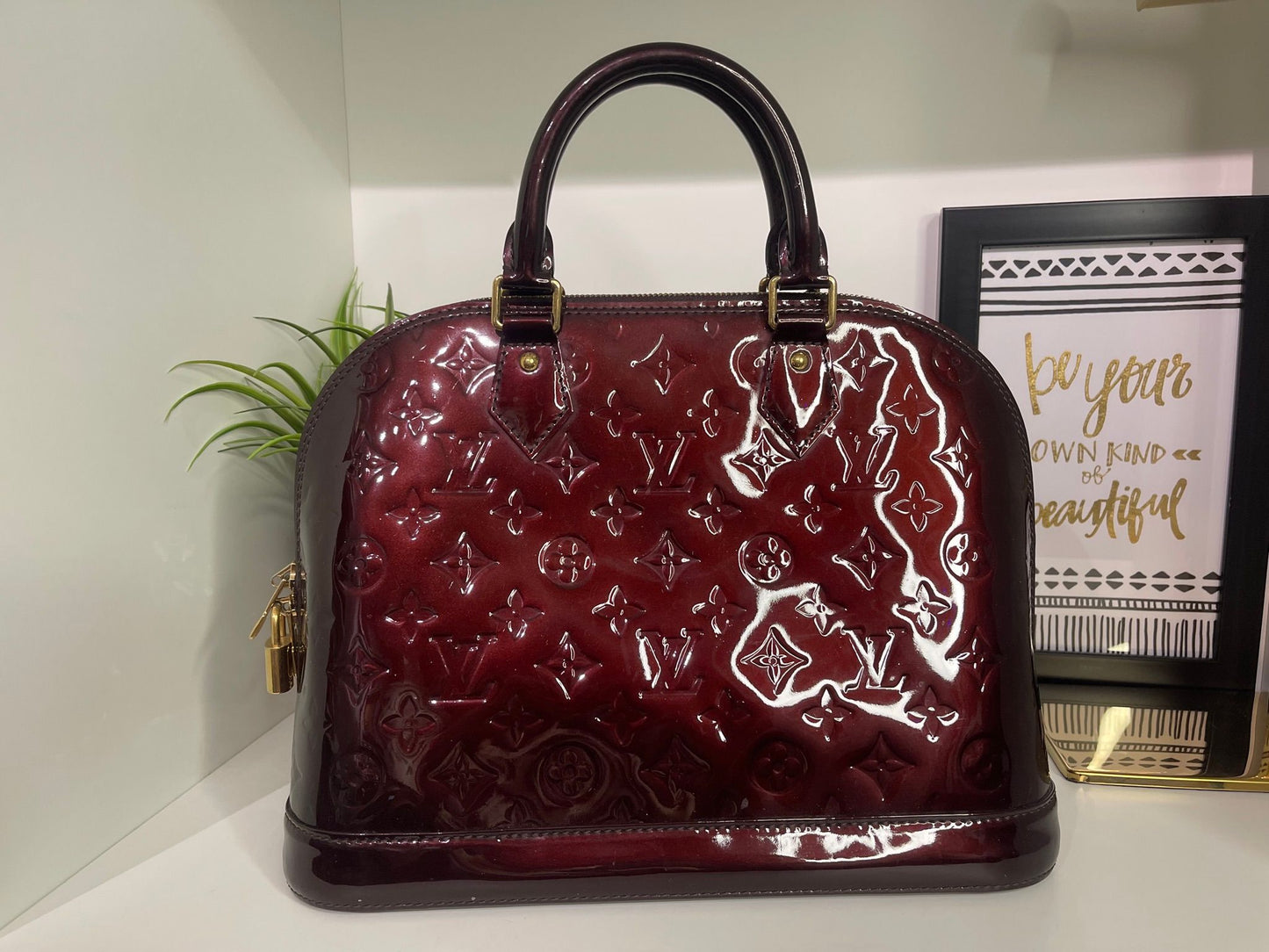 130. Louis Vuitton Vernis Amarante Alma PM