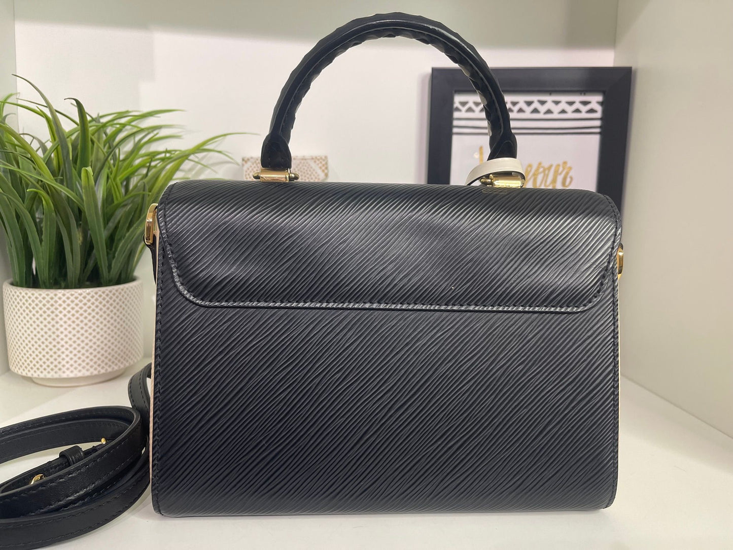 91. Louis Vuitton Crafty MM Epi Twist