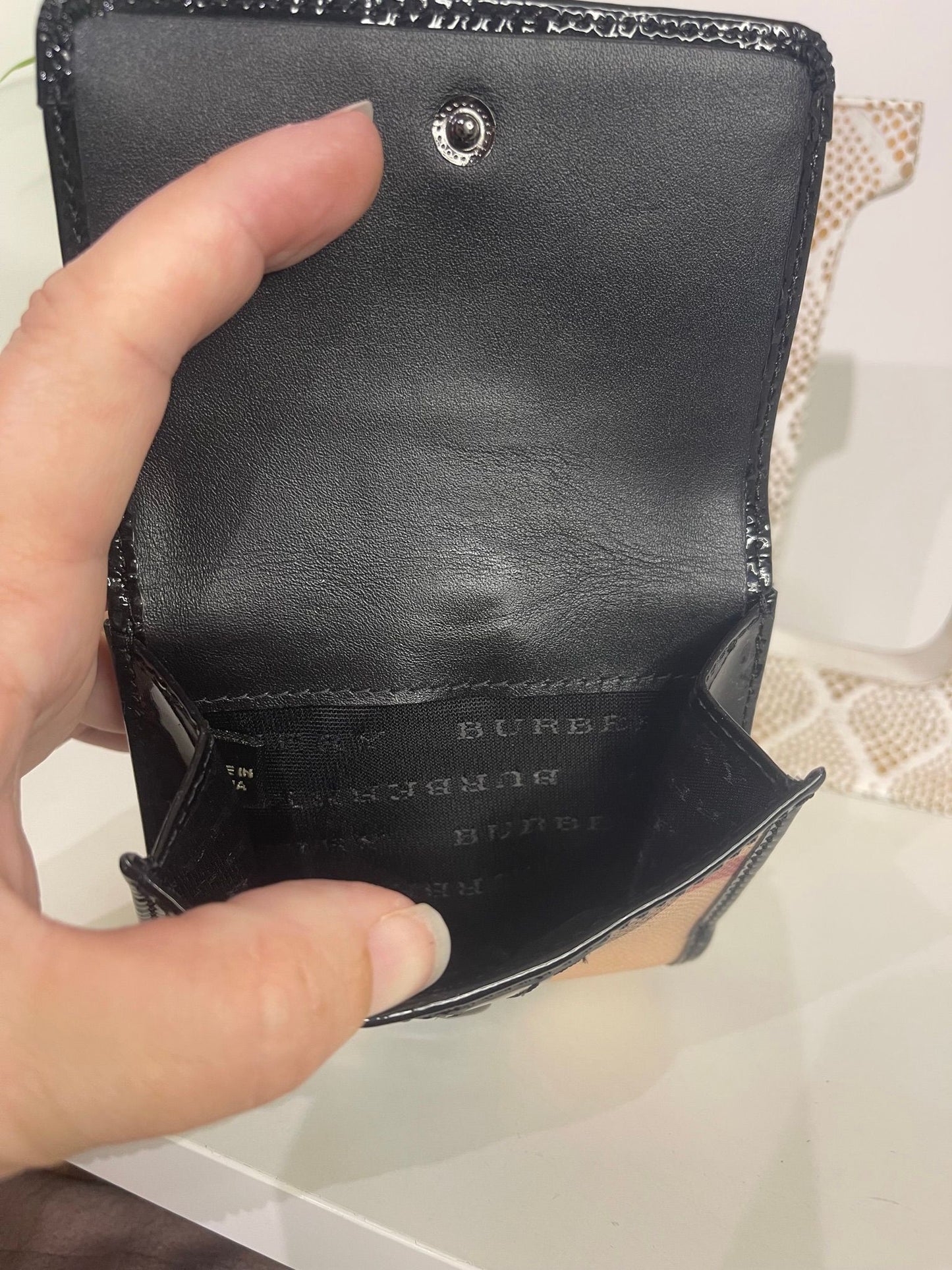 67. Burberry Compact Wallet
