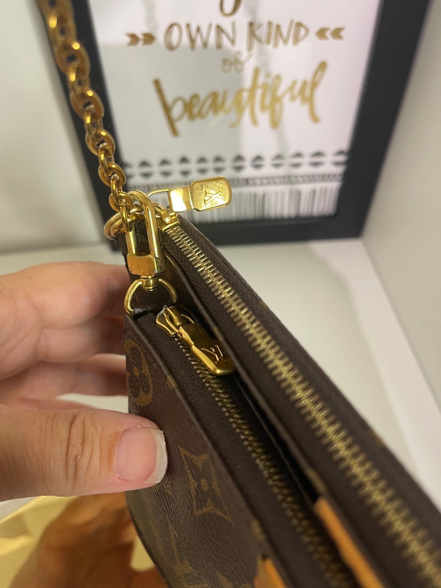 32. Louis Vuitton Monogram Multi Pouchette