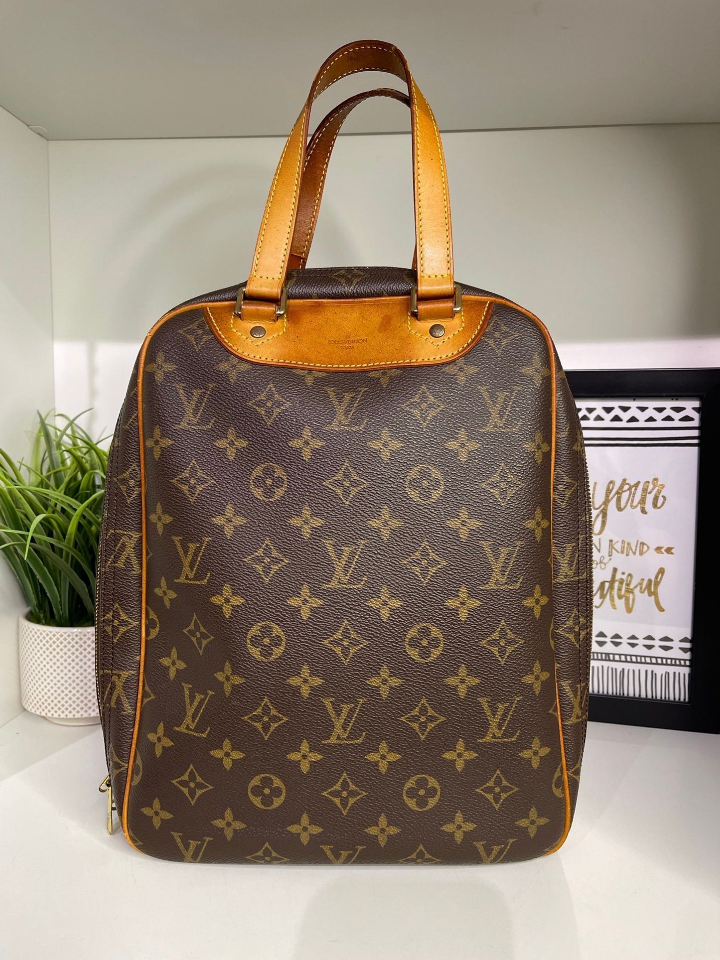 18. Louis Vuitton Monogram Excursion