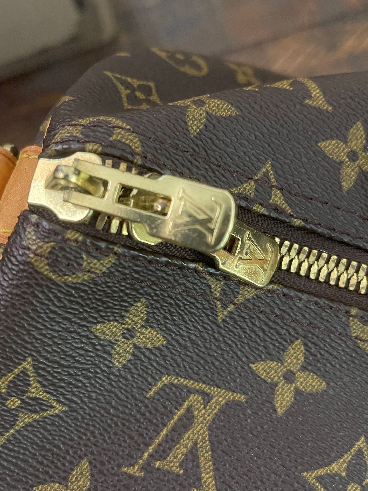 38. Louis Vuitton KeepAll 50 Bandolier (NO STRAP)