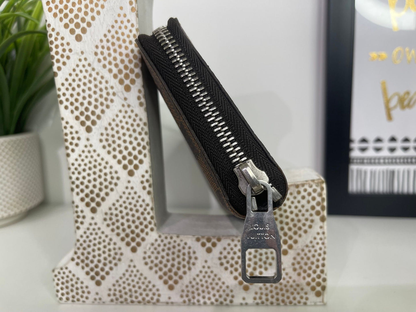 43. Louis Vuitton Damier Ebene Zippy Wallet