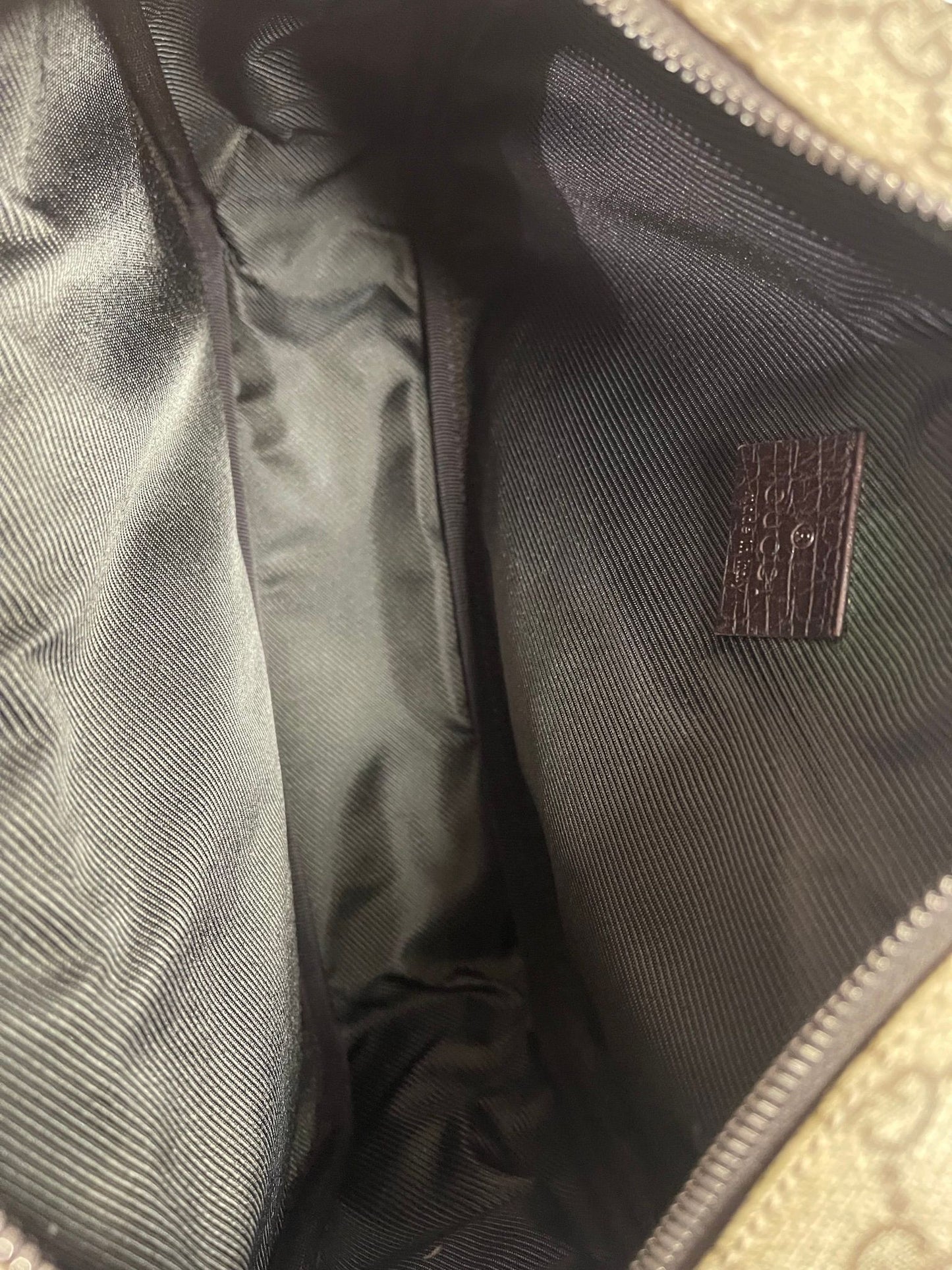 49. Gucci Supreme Crossbody Camera Bag