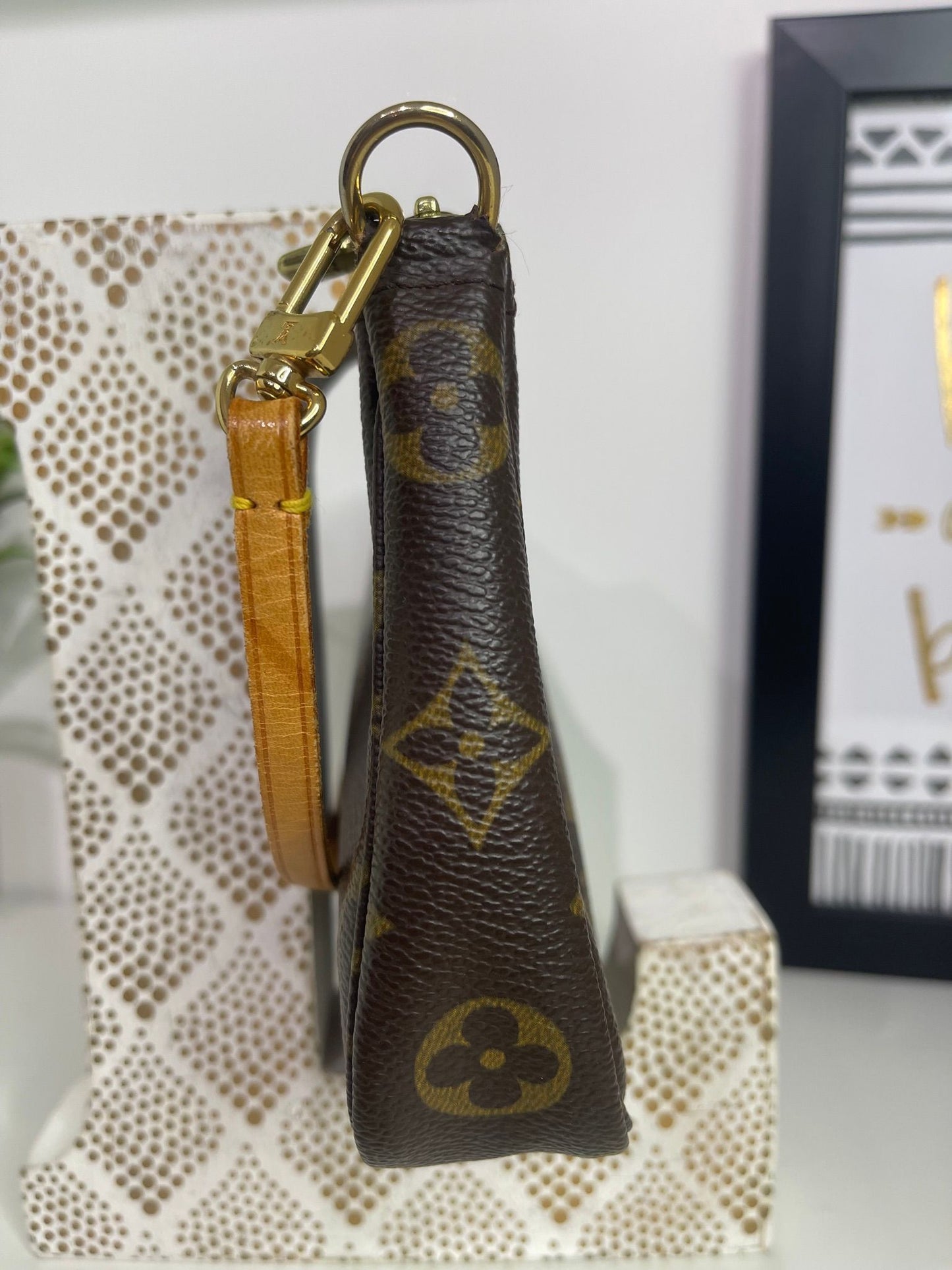 71. Louis Vuitton Monogram Pouchette