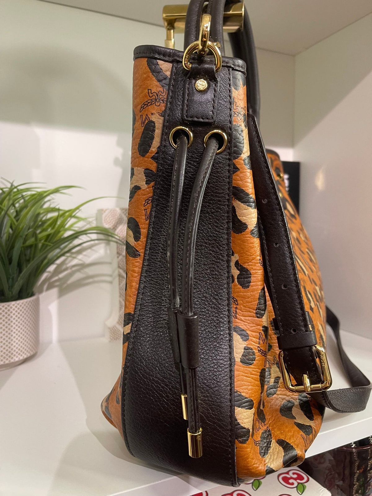 109. MCM Visetos Leopard Print Draw String Shoulder Bag