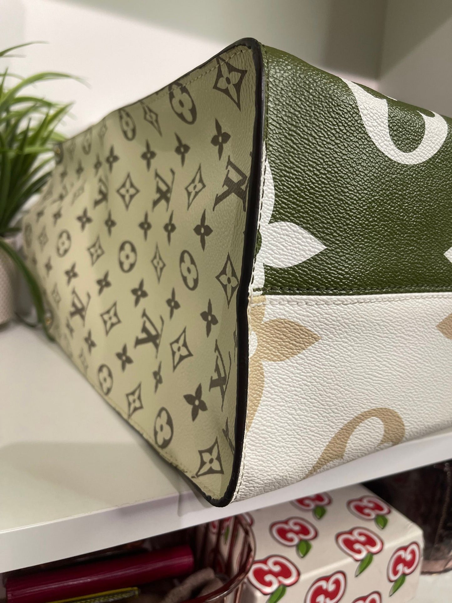 57. Louis Vuitton OnTheGo GM khaki & Green Tote