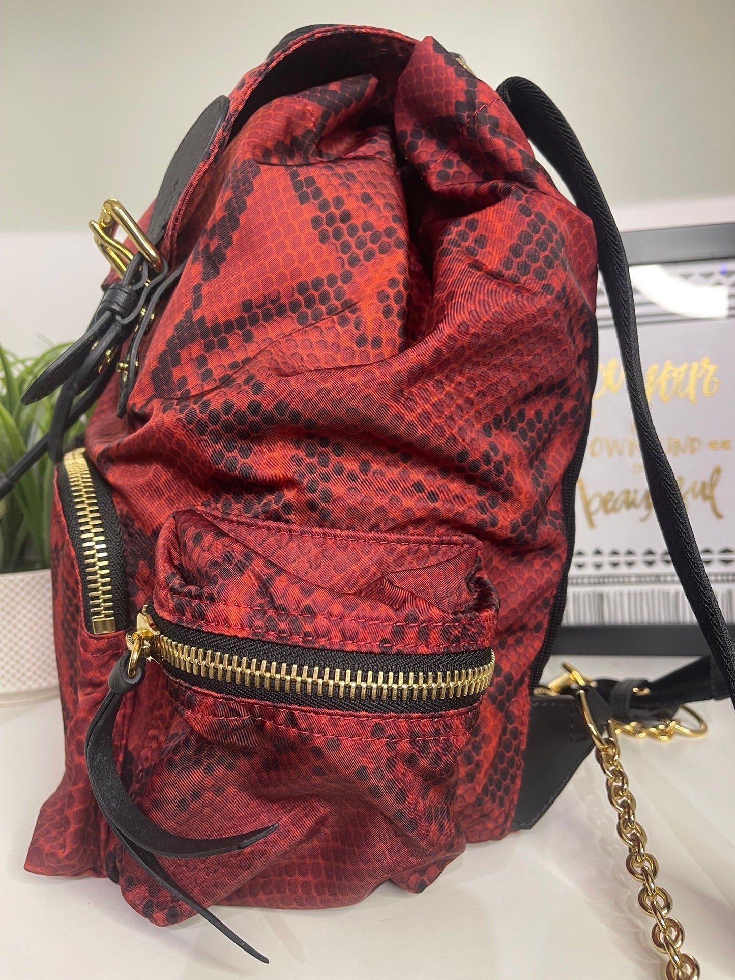 11. Burberry Nylon Red/Black Snake Print Backpack