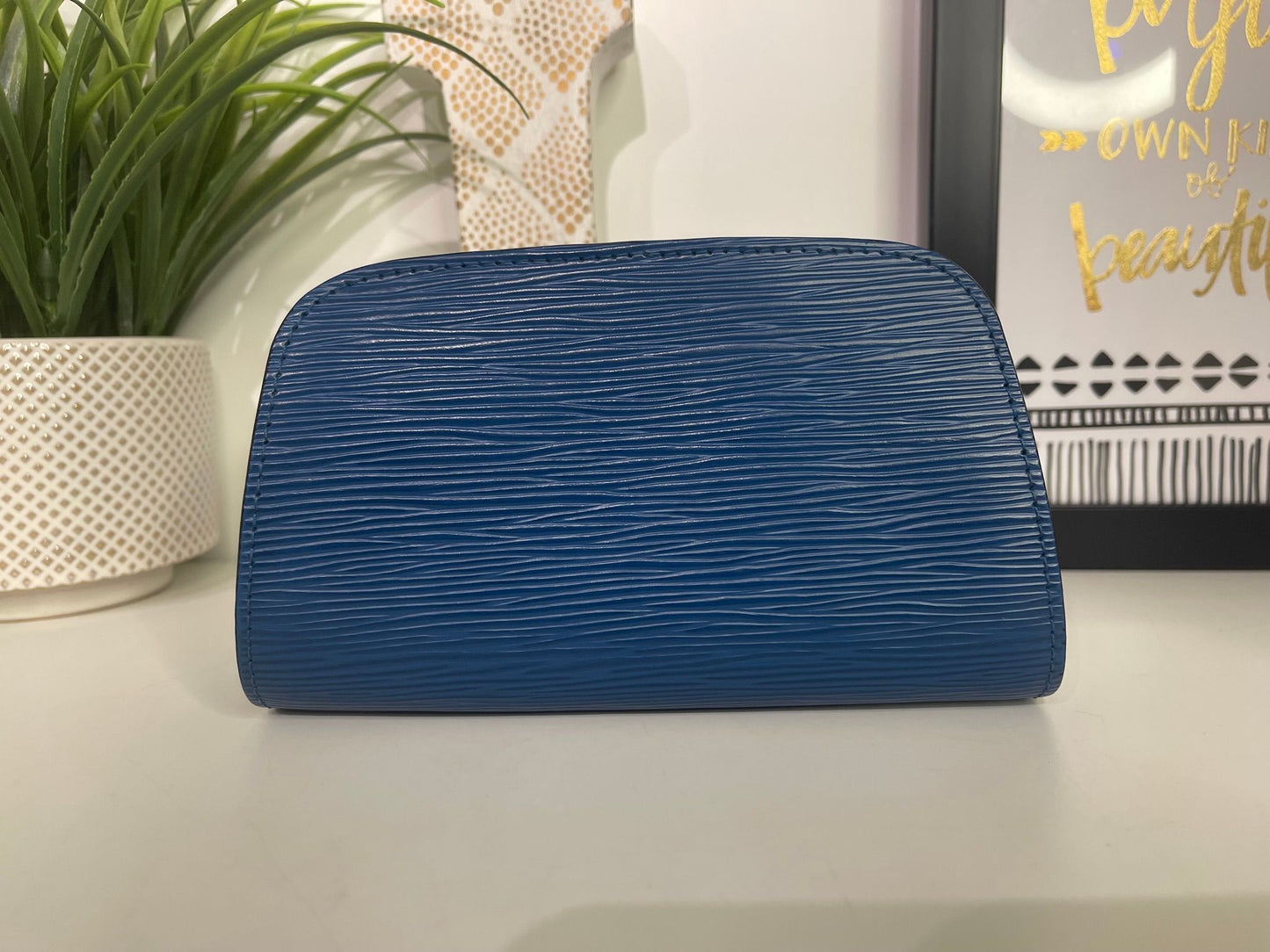 114. Louis Vuitton Blue Epi Cosmetic Case