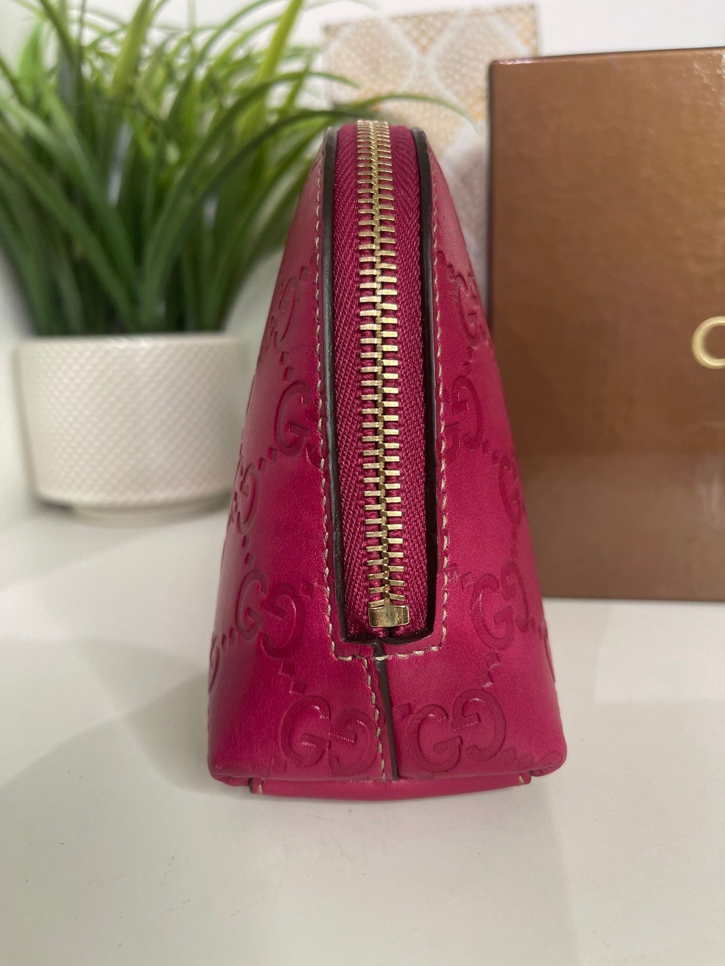 121. Gucci Fuscia Cosmetic Bag