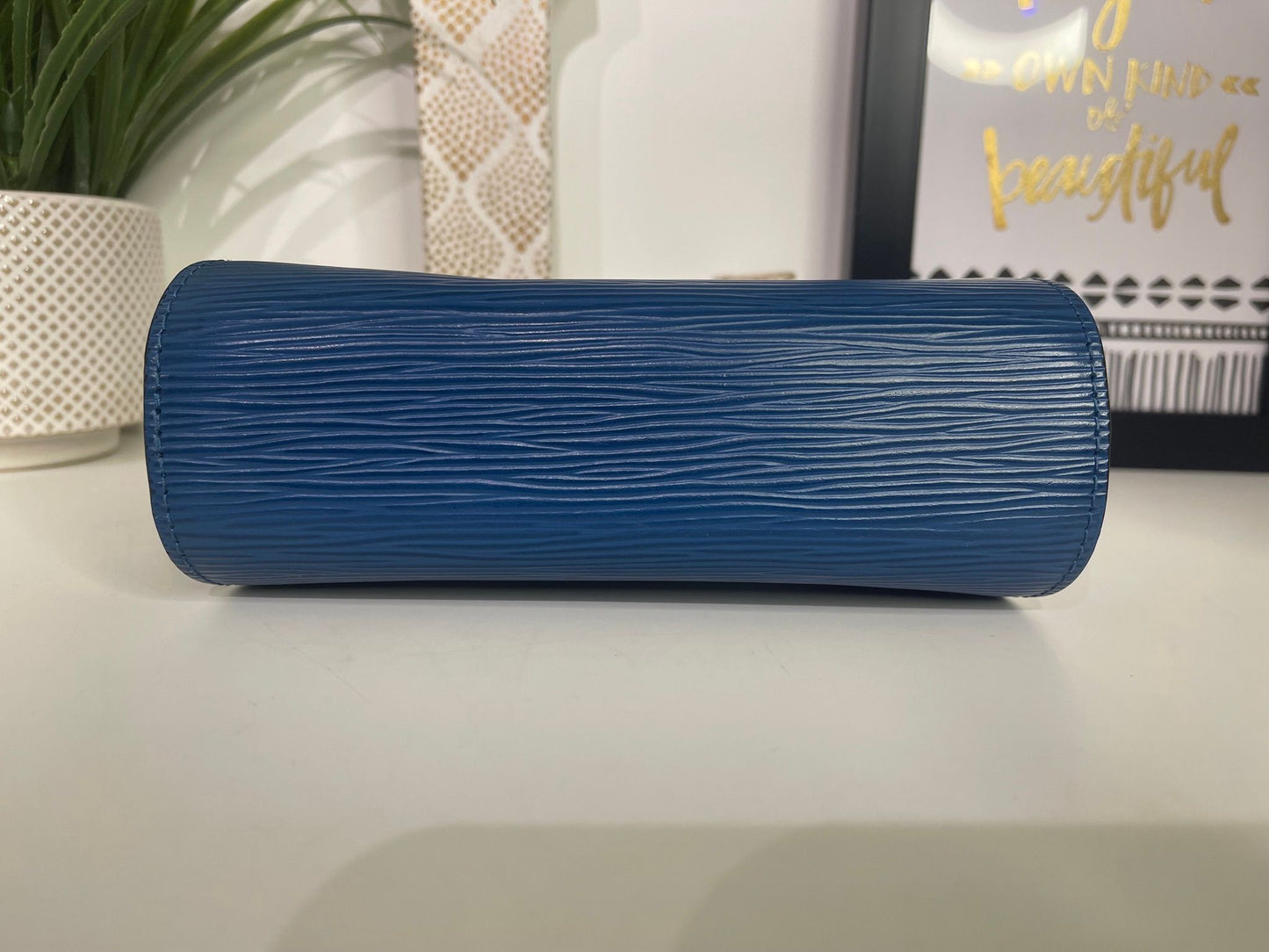 114. Louis Vuitton Blue Epi Cosmetic Case