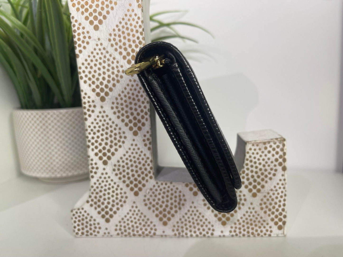 54. Louis Vuitton Black Epi Tressor Wallet