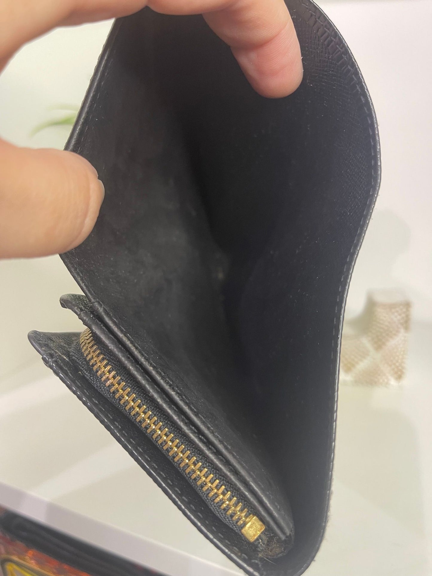 54. Louis Vuitton Black Epi Tressor Wallet